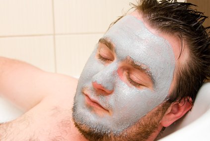 Man enjoying facial treatment